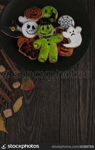 Homemade delicious ginger biscuits for Halloween. Homemade delicious ginger biscuits for Halloween on wooden table