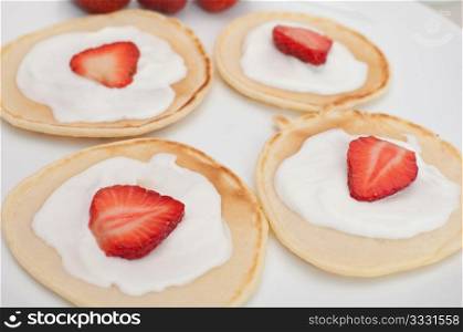 Homemade Flapjacks / Pancakes With Strawberries and Sweet Cream