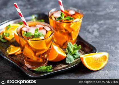 homemade flavored orange iced tea, refreshing summer beverage