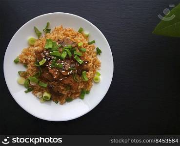 Homemade food. Fried rice with pork and mushrooms. Homemade food. Fried rice with pork