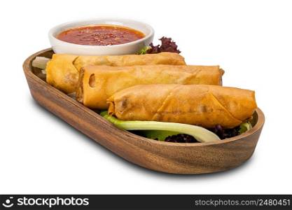 Homemade Fried Spring Roll with chili sauce and vegetables in wooden tray isolated on white background with clipping path.