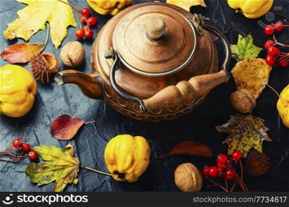 Homemade fruit tea from autumn quince.Hot apple tea drink. Autumn tea with quince