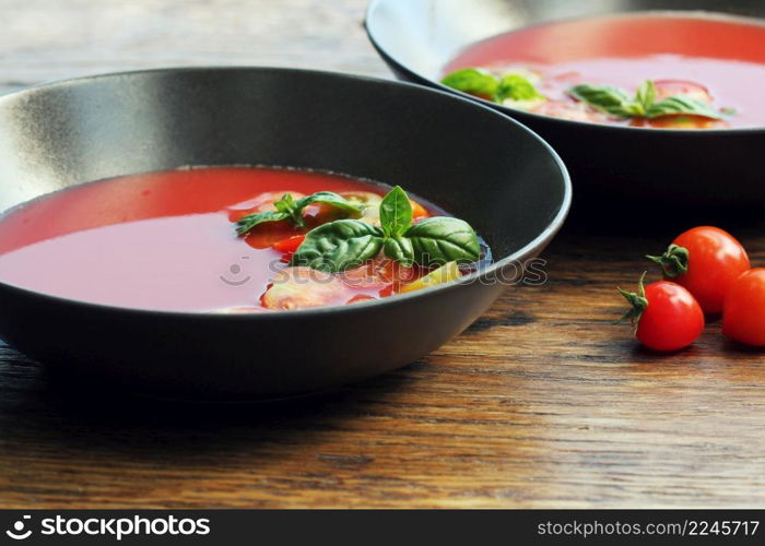 Homemade Gazpacho tomato soup in brown bowl. Healthy eating concept.. Homemade Gazpacho tomato soup in brown bowl. Healthy eating concept