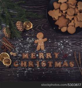 Homemade ginger cookies. Homemade ginger cookies for new years and christmas on wooden background, xmas theme
