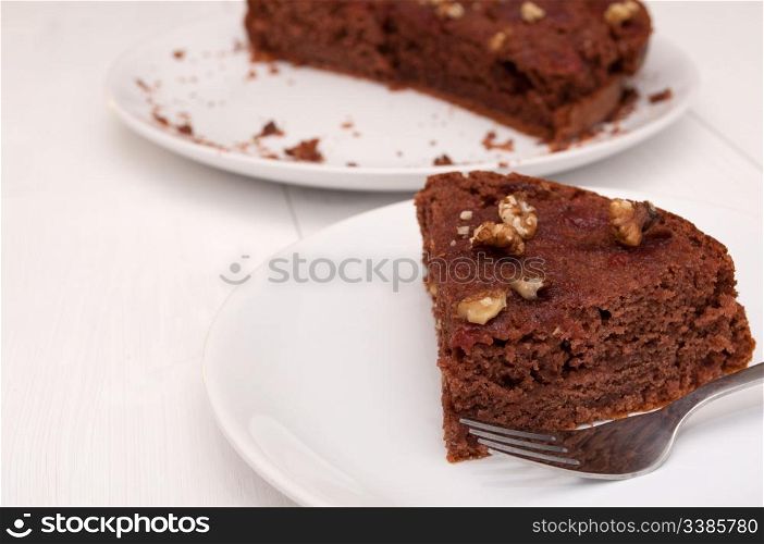 Homemade Gingerbread Cake With Jam and Walnuts on Plate