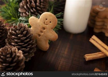 Homemade gingerbread man cookie peek out, traditionally made at Christmas and the holidays.