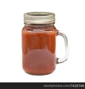 Homemade gourmet barbecue sauce in glass jar isolated on white background