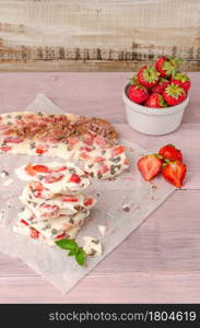 Homemade healthy frozen strawberry yogurt bark. Top view