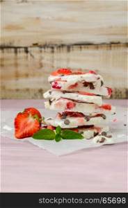 Homemade healthy frozen strawberry yogurt bark. Top view