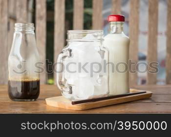 Homemade iced coffee ingredient on wooden table, stock photo