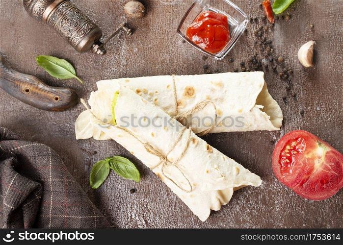 Homemade lavash, shawarma with vegetables, chicken, cheese