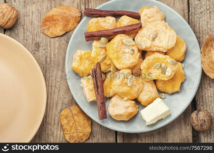 Homemade lazy pumpkin dumplings on a plate. Pumpkin dumplings lazy