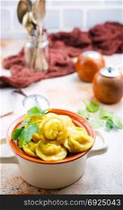 Homemade meat dumplings - russian pelmeni. Stock photo