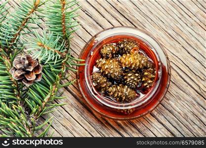 Homemade medicinal jam from pine cones.Natural Medicine. Jam from pine cones