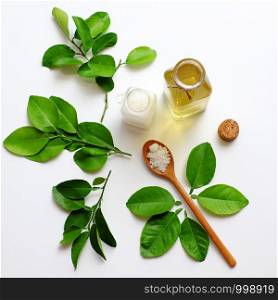 Homemade natural herbal oral care product from lemon leaves and salt boil with water make yellow mouthwash for dental hygiene, treatment bacteria in oral cavity, make fresh breath