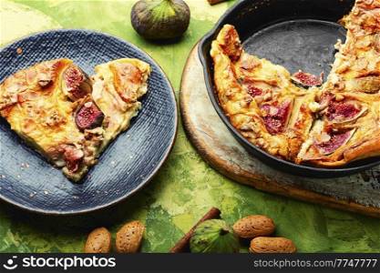 Homemade omelet with figs and almonds.Healthy breakfast. Omelet or omelette with figs and nuts.