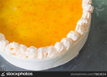Homemade orange marmalade whipped cream cake, stock photo
