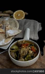 Homemade pita bread served with Green curry chicken (Kaeng khiao wan). Muslim food, No focus, specifically.
