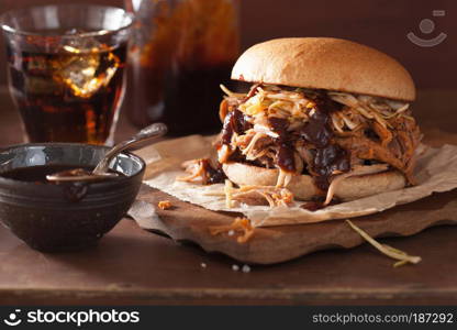 homemade pulled pork burger with coleslaw and bbq sauce