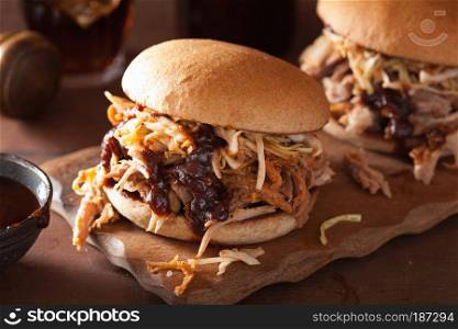 homemade pulled pork burger with coleslaw and bbq sauce