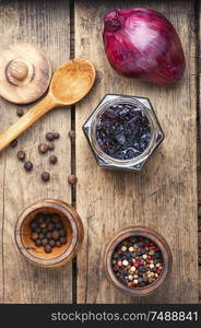 Homemade red onion jam.Onion confiture on old wooden table. Onion jam or onion confiture