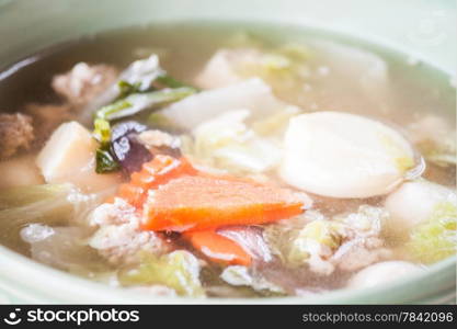 Homemade soup with egg tofu, minced pork and vegetable