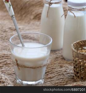 Homemade soy milk for breakfast drink, soya milk and soybean on burlap background, this beverage rich omega, protein, fibre, also delicious, nutrition, healthy drink