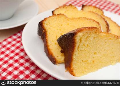 Homemade Sponge Cake and Cup on Table
