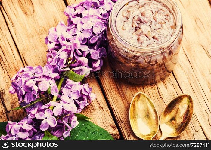 Homemade spring jam of lilac petals. Medicinal jam.. Healing lilac flower jam