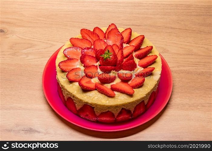 homemade strawberry cake in a red dish