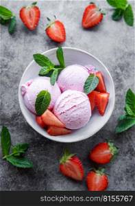 Homemade strawberry  ice cream with fresh strawberries. Sweet berry summer dessert. 