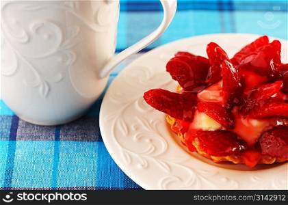 Homemade strawberry tart on table