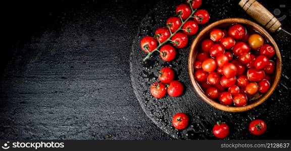 Homemade tomatoes for pickling in a plate. On a black background. High quality photo. Homemade tomatoes for pickling in a plate.