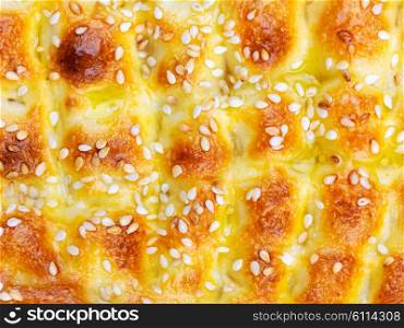 Homemade traditional Turkish meal pide stuffed with meat cheese, and sauce isolated on white background