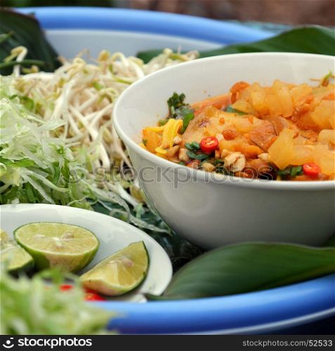 Homemade Vietnam food, Mi Quang Dalat, a kind of noodle soup with raw material as yellow noodle, dried shrimp, pork, vegetable from colorful ingredient