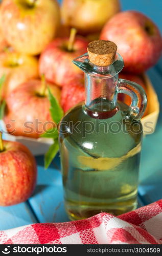 Homemade Vinegar galas apples on a table in a farmhouse