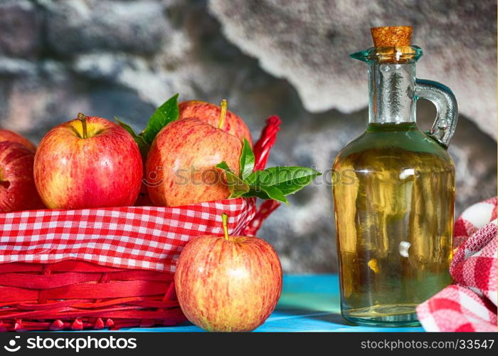 Homemade Vinegar galas apples on a table in a farmhouse