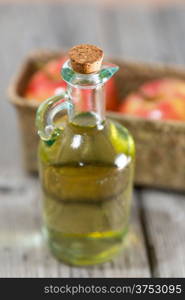 Homemade Vinegar galas apples on a table in a farmhouse