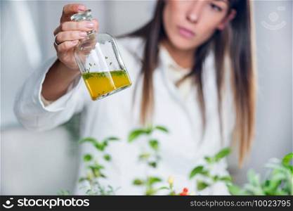 Homeopath preparing herbal remedies