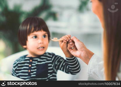 Homeopathy. Little boy and homeopath