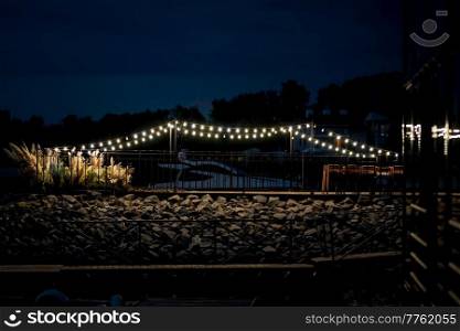 Hona wedding ceremony on the pier near the water