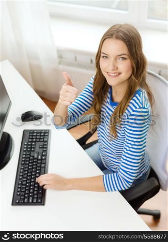 hone, technology and education concept - dreaming teenage girl with computer showing thumbs up at home