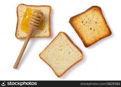 honey and bread isolated on white background