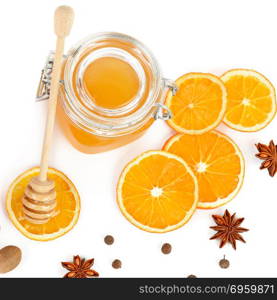 Honey and orange slices isolated on white background. Flat lay, . Bee honey and orange slices isolated on white background. Flat lay, top view.