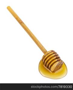 honey and wooden dipper isolated