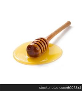 honey and wooden dipper isolated on white background