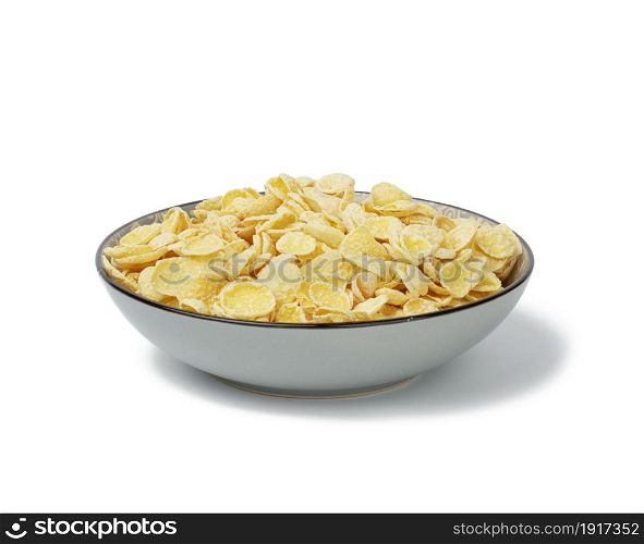honey cornflakes on a white background. Morning breakfast with milk