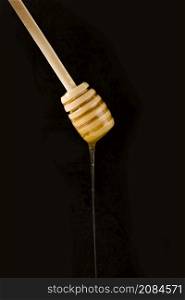honey falling from spoon