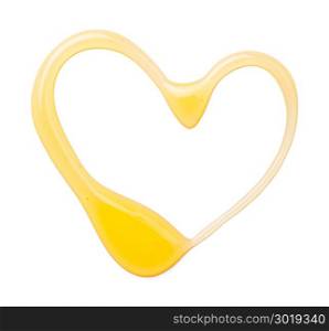 Honey isolated on white background. Heart shape splash. Top view