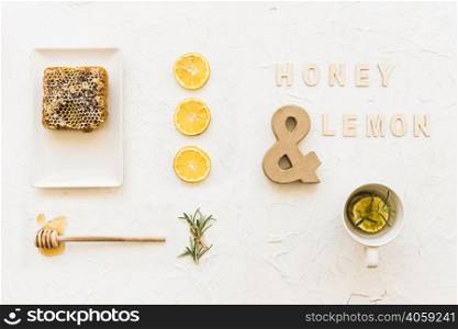 honey lemon tea with honeycomb lemon slices rosemary